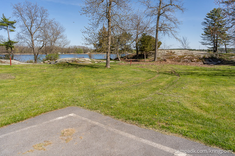 Campsite Photo of Site 13 at Kring Point State Park, New York - Looking at Site from Road Sign Visible