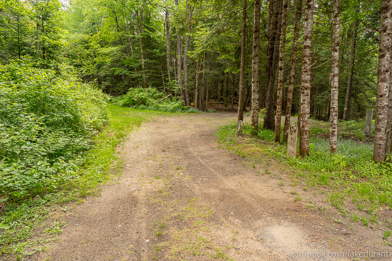 Campsite Photo of Site 5A at Lake Durant Campground, New York - Looking at Site from Road Sign Visible