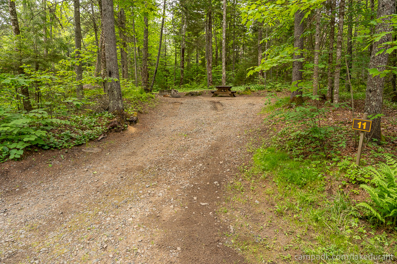 Campsite Photo of Site 11 at Lake Durant Campground, New York - Looking at Site from Road Sign Visible