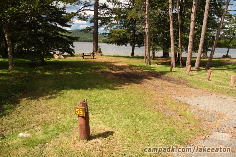 Campsite Photo of Site 55 at Lake Eaton Campground, New York - Looking at Site from Road Sign Visible