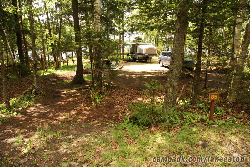Campsite Photo of Site 85 at Lake Eaton Campground, New York - Looking at Site from Road Sign Visible