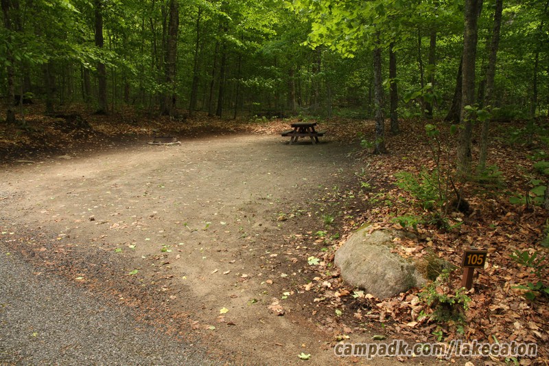 Campsite Photo of Site 105 at Lake Eaton Campground, New York - Looking at Site from Road Sign Visible