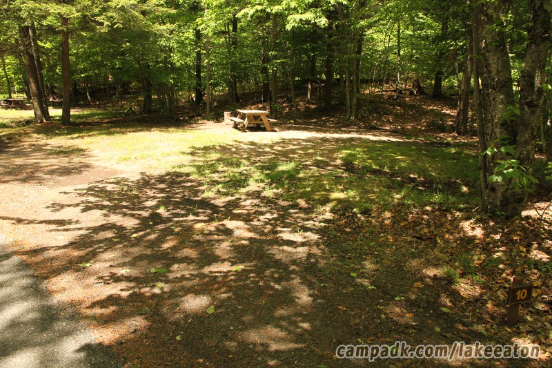 Campsite Photo of Site 10 at Lake Eaton Campground, New York - Looking at Site from Road Sign Visible