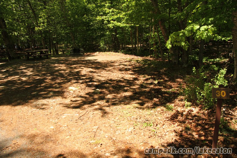 Campsite Photo of Site 30 at Lake Eaton Campground, New York - Looking at Site from Road Sign Visible