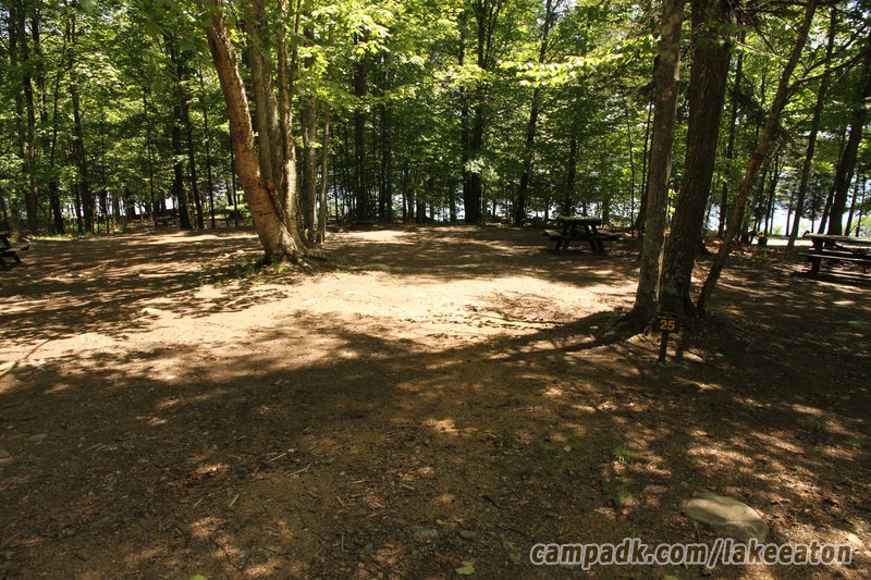Campsite Photo of Site 25 at Lake Eaton Campground, New York - Looking at Site from Road Sign Visible