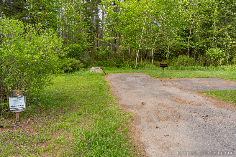 Campsite Photo of Site 6 at Lake Eaton Campground, New York - Looking at Site from Road Sign Visible