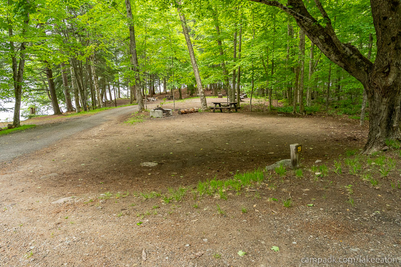 Campsite Photo of Site 29 at Lake Eaton Campground, New York - Looking at Site from Road Sign Visible