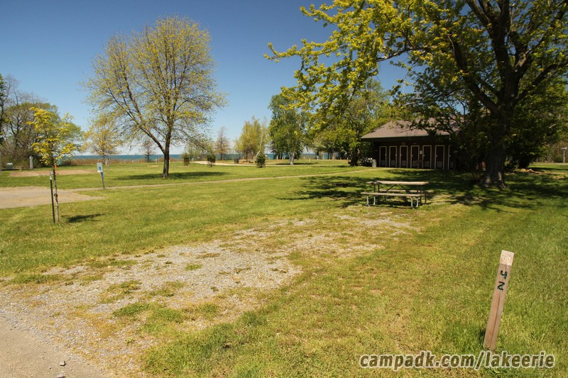 Campsite Photo of Site 42 at Lake Erie State Park, New York - Looking at Site from Road Sign Visible