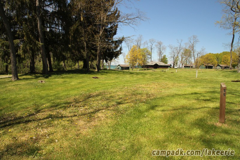 Campsite Photo of Site 95 at Lake Erie State Park, New York - Looking at Site from Road Sign Visible