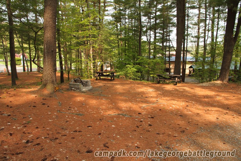 Campsite Photo of Site 30 at Lake George Battleground Campground, New York - Looking at Site from Road Sign Visible