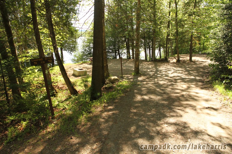 Campsite Photo of Site 71 at Lake Harris Campground, New York - Looking at Site from Road Sign Visible