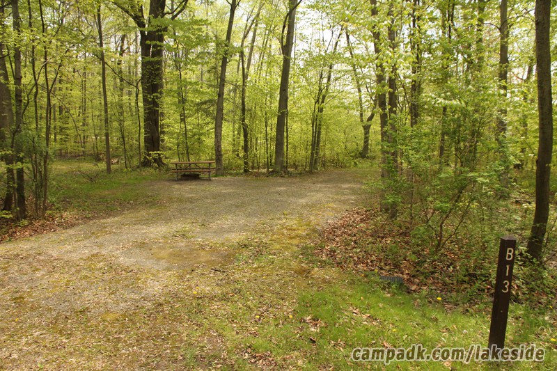 Campsite Photo of Site B13 at Lakeside State Park, New York - Looking at Site from Road Sign Visible