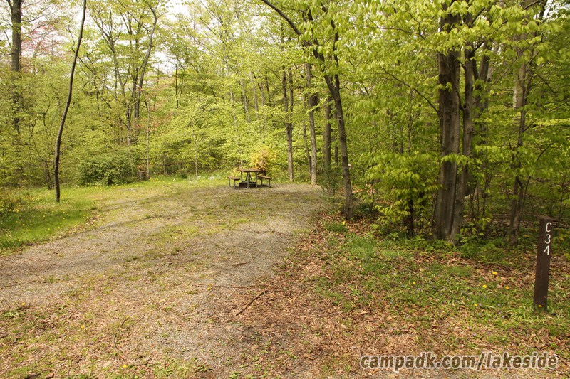 Campsite Photo of Site C34 at Lakeside State Park, New York - Looking at Site from Road Sign Visible