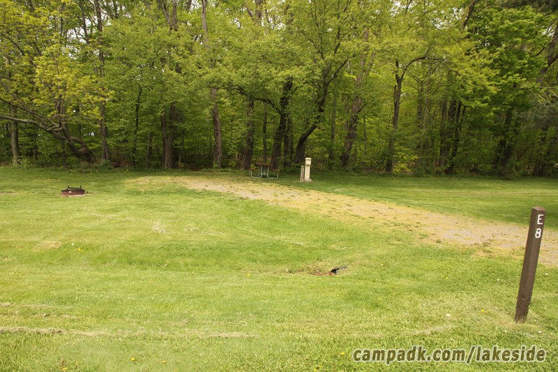 Campsite Photo of Site E8 at Lakeside State Park, New York - Looking at Site from Road Sign Visible
