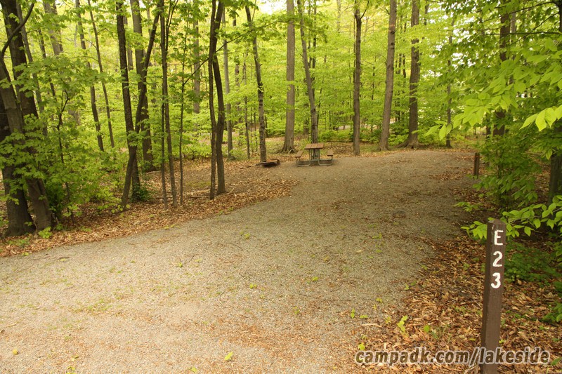 Campsite Photo of Site E23 at Lakeside State Park, New York - Looking at Site from Road Sign Visible