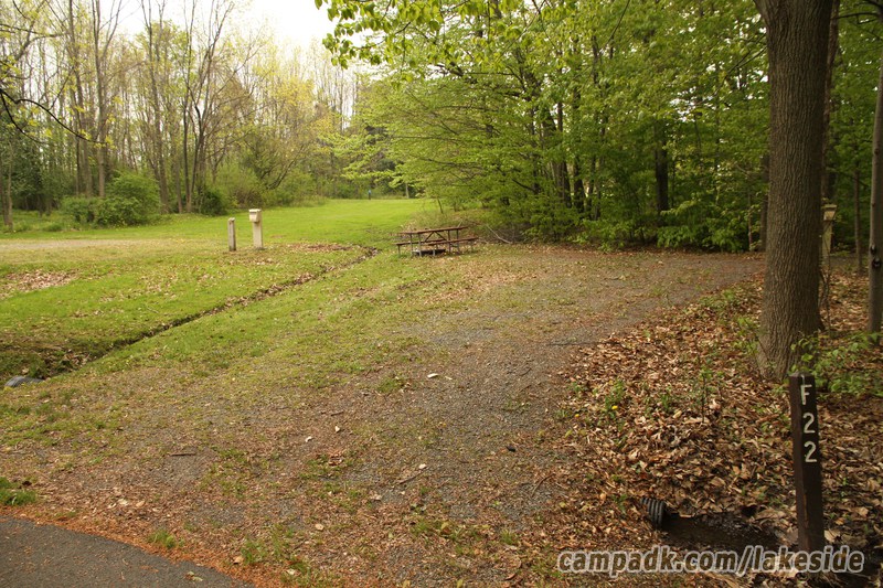 Campsite Photo of Site F22 at Lakeside State Park, New York - Looking at Site from Road Sign Visible