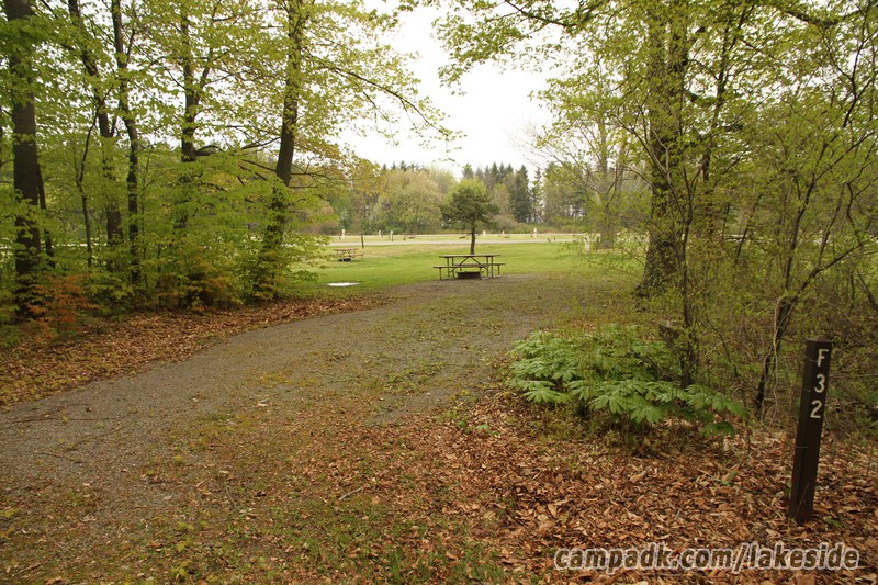 Campsite Photo of Site F32 at Lakeside State Park, New York - Looking at Site from Road Sign Visible