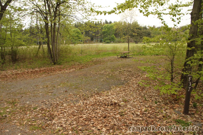 Campsite Photo of Site F37 at Lakeside State Park, New York - Looking at Site from Road Sign Visible