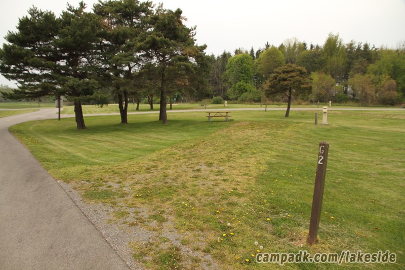 Campsite Photo of Site G2 at Lakeside State Park, New York - Looking at Site from Road Sign Visible