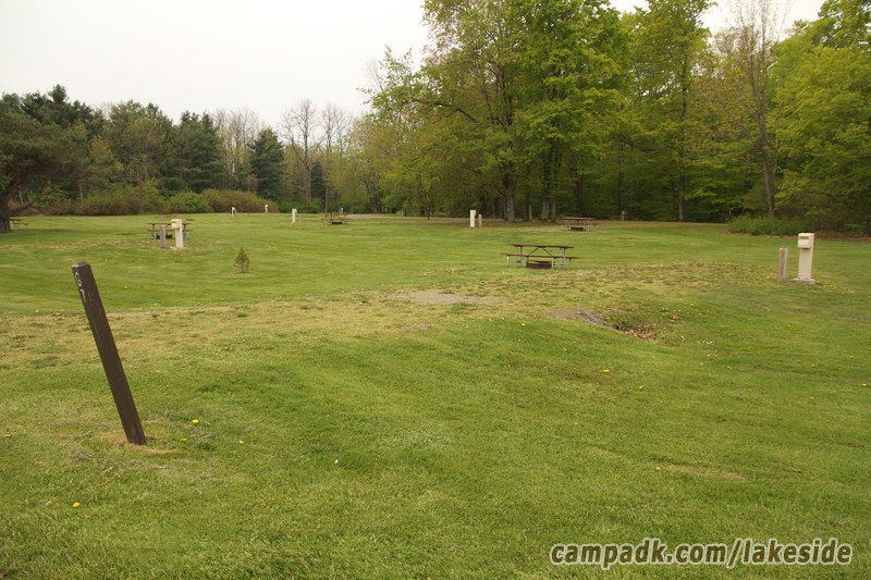 Campsite Photo of Site G7 at Lakeside State Park, New York - Looking at Site from Road Sign Visible