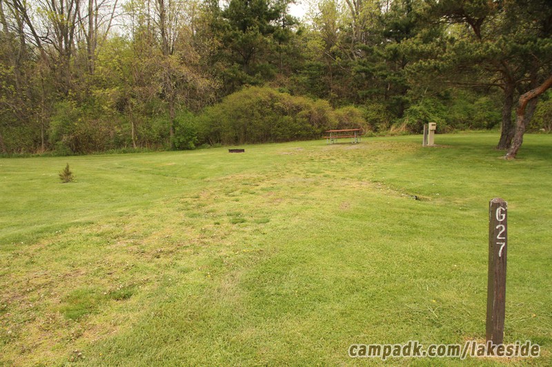 Campsite Photo of Site G27 at Lakeside State Park, New York - Looking at Site from Road Sign Visible