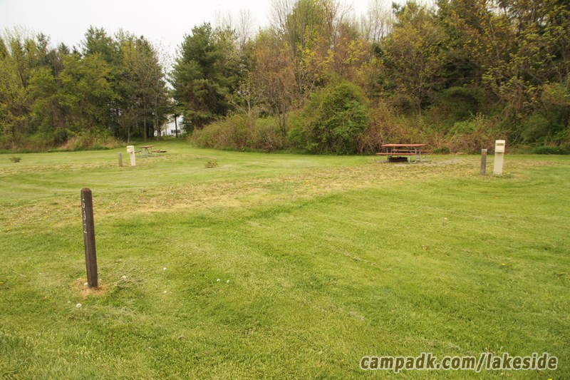 Campsite Photo of Site G32 at Lakeside State Park, New York - Looking at Site from Road Sign Visible