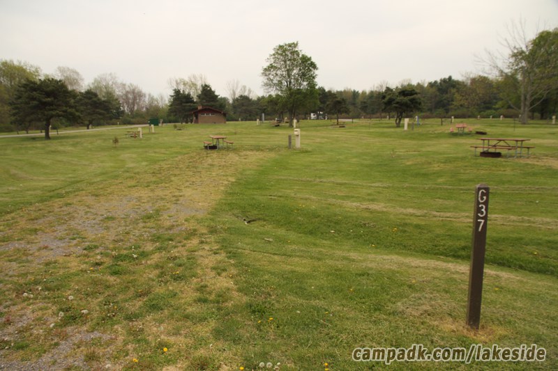 Campsite Photo of Site G37 at Lakeside State Park, New York - Looking at Site from Road Sign Visible