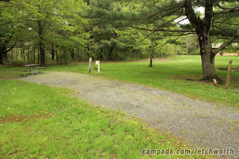 Campsite Photo of Site 320 at Letchworth State Park, New York - Looking at Site from Road Sign Visible
