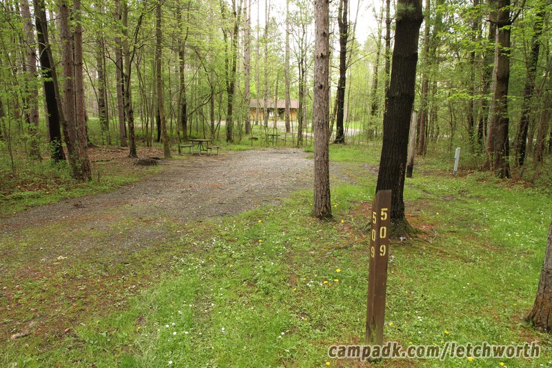 Campsite Photo of Site 509 at Letchworth State Park, New York - Looking at Site from Road Sign Visible