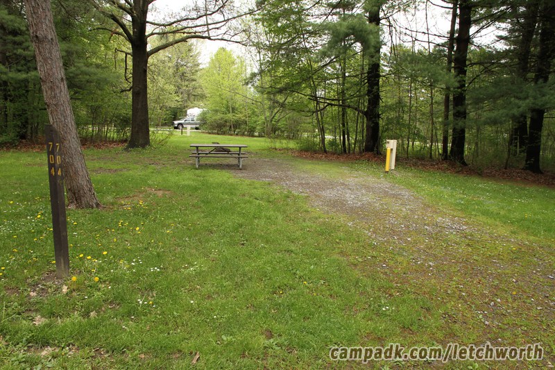 Campsite Photo of Site 704 at Letchworth State Park, New York - Looking at Site from Road Sign Visible
