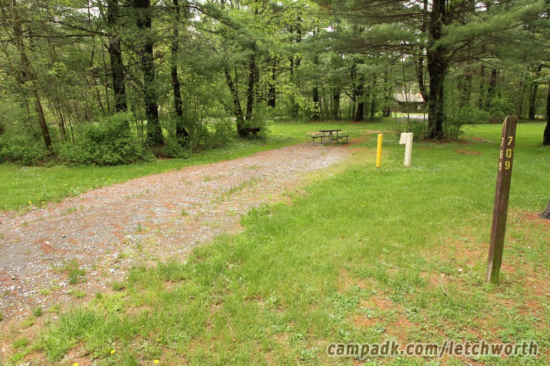 Campsite Photo of Site 709 at Letchworth State Park, New York - Looking at Site from Road Sign Visible