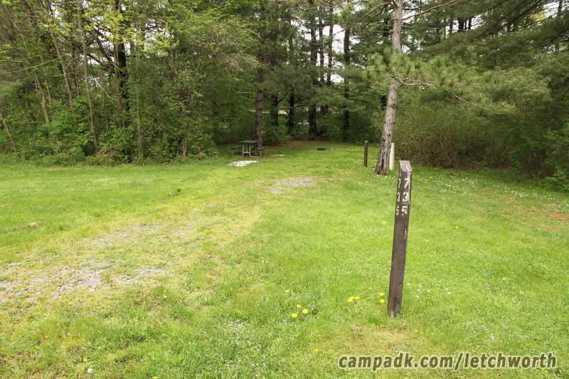 Campsite Photo of Site 735 at Letchworth State Park, New York - Looking at Site from Road Sign Visible