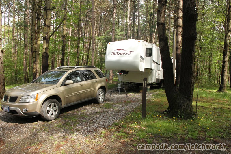 Campsite Photo of Site 221 at Letchworth State Park, New York - Looking at Site from Road Sign Visible