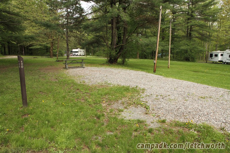 Campsite Photo of Site 120 at Letchworth State Park, New York - Looking at Site from Road Sign Visible