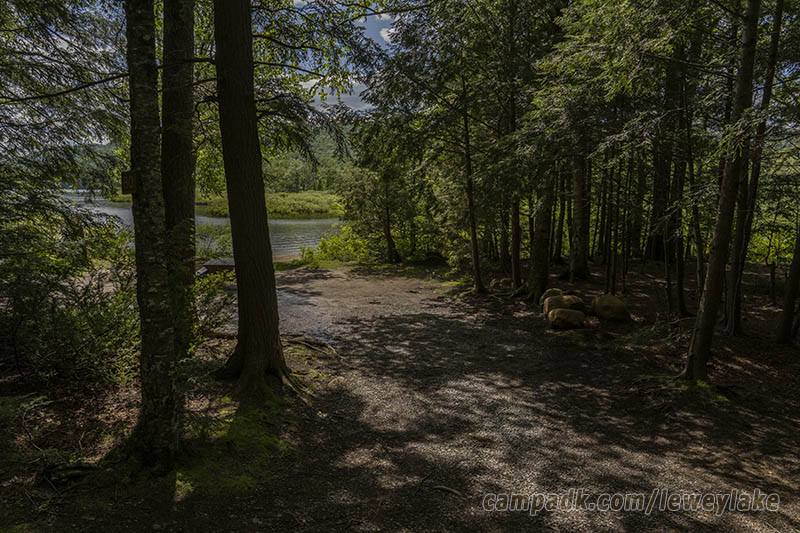 Campsite Photo of Site 80 at Lewey Lake Campground, New York - Looking at Site from Road Sign Visible