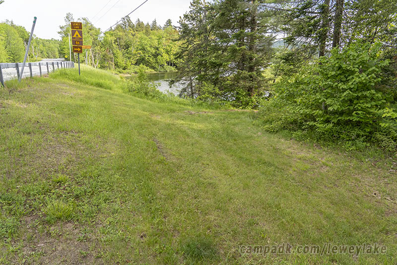 Campsite Photo of Site 34 at Lewey Lake Campground, New York - Looking at Site from Road Sign Visible