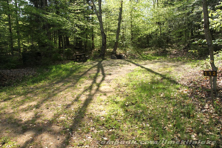 Campsite Photo of Site 112 at Limekiln Lake Campground, New York - Looking at Site from Road Sign Visible