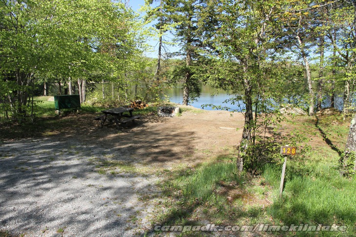 Campsite Photo of Site 128 at Limekiln Lake Campground, New York - Looking at Site from Road Sign Visible