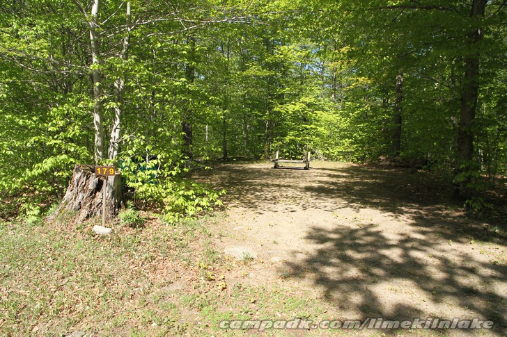 Campsite Photo of Site 179 at Limekiln Lake Campground, New York - Looking at Site from Road Sign Visible