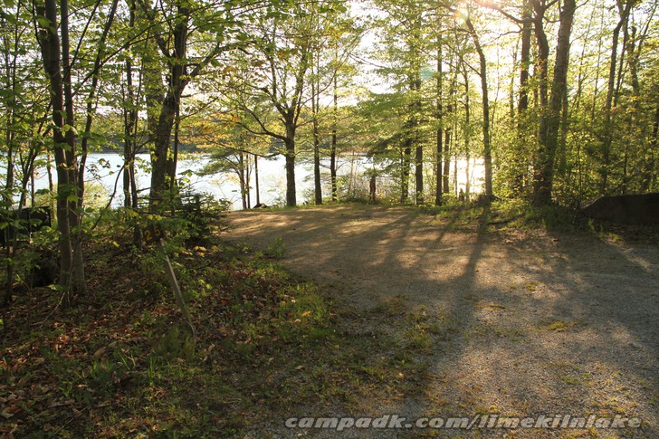 Campsite Photo of Site 25 at Limekiln Lake Campground, New York - Looking at Site from Road Sign Visible