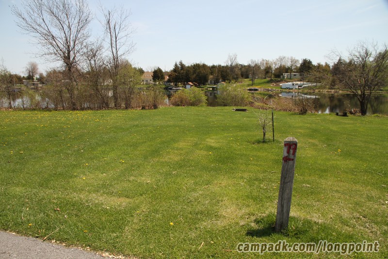 Campsite Photo of Site 79 at Long Point State Park, New York - Looking at Site from Road Sign Visible