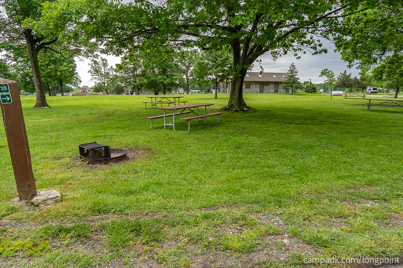 Campsite Photo of Site 39 at Long Point State Park, New York - Looking at Site from Road Sign Visible