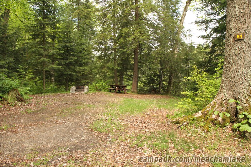Campsite Photo of Site 84 at Meacham Lake Campground, New York - Looking at Site from Road Sign Visible