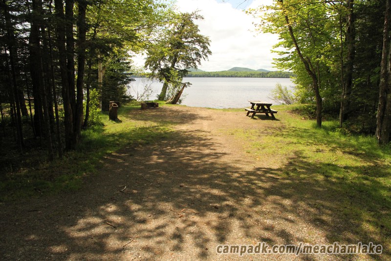 Campsite Photo of Site 154 at Meacham Lake Campground, New York - Looking at Site from Road Sign Visible