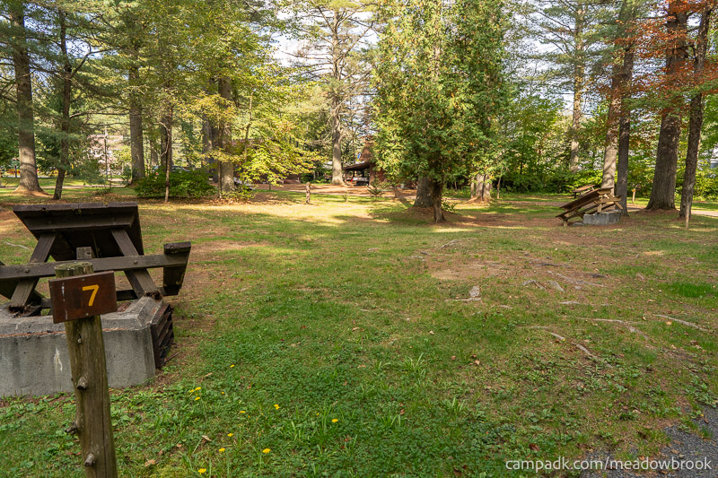 Campsite Photo of Site 7 at Meadowbrook Campground, New York - Looking at Site from Road Sign Visible