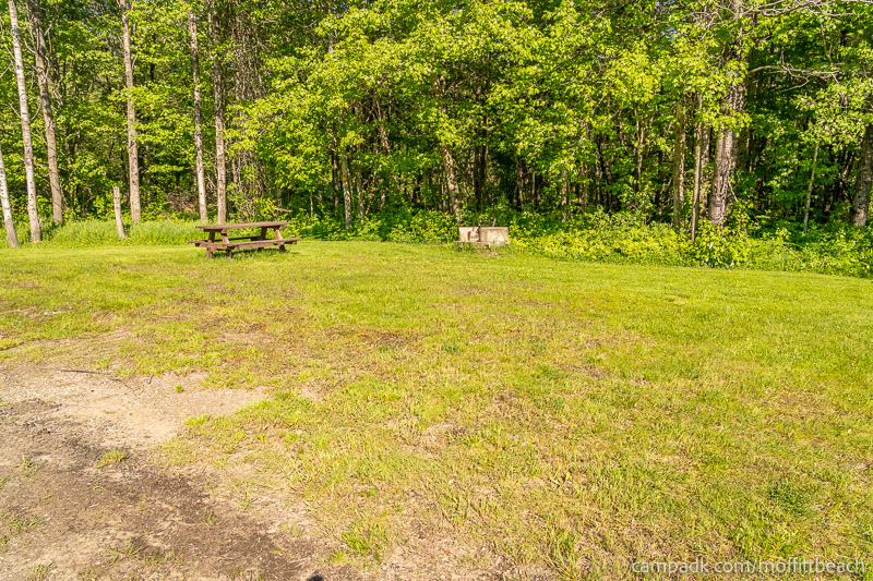 Campsite Photo of Site 90 at Moffitt Beach Campground, New York - Looking at Site from Road Sign Visible