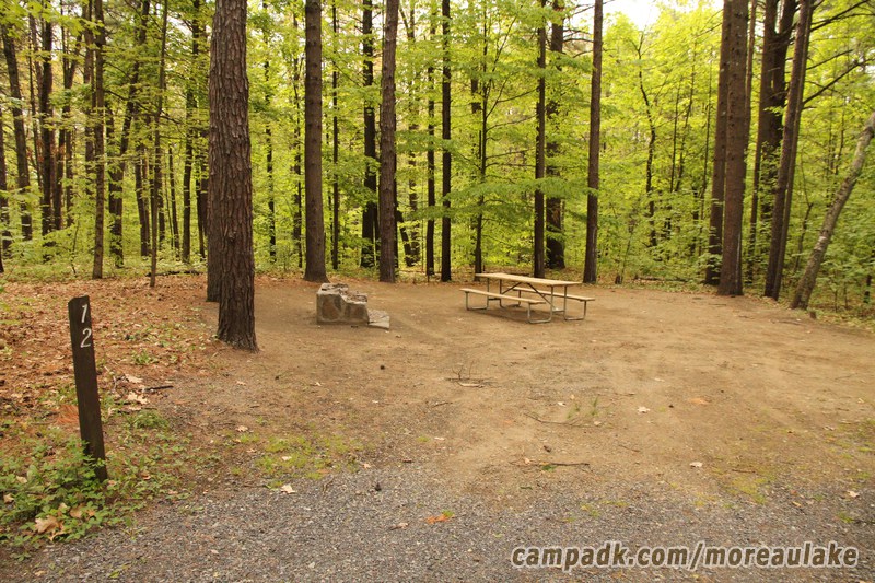 Campsite Photo of Site 12 at Moreau Lake State Park, New York - Looking at Site from Road Sign Visible