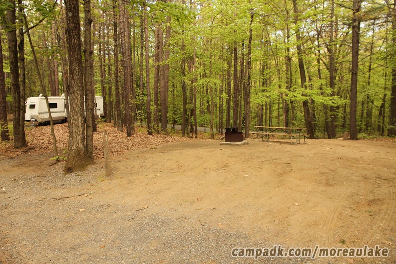 Campsite Photo of Site 27 at Moreau Lake State Park, New York - Looking at Site from Road Sign Visible