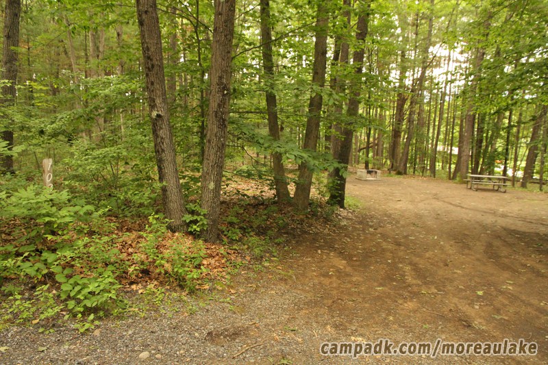 Campsite Photo of Site 108 at Moreau Lake State Park, New York - Looking at Site from Road Sign Visible