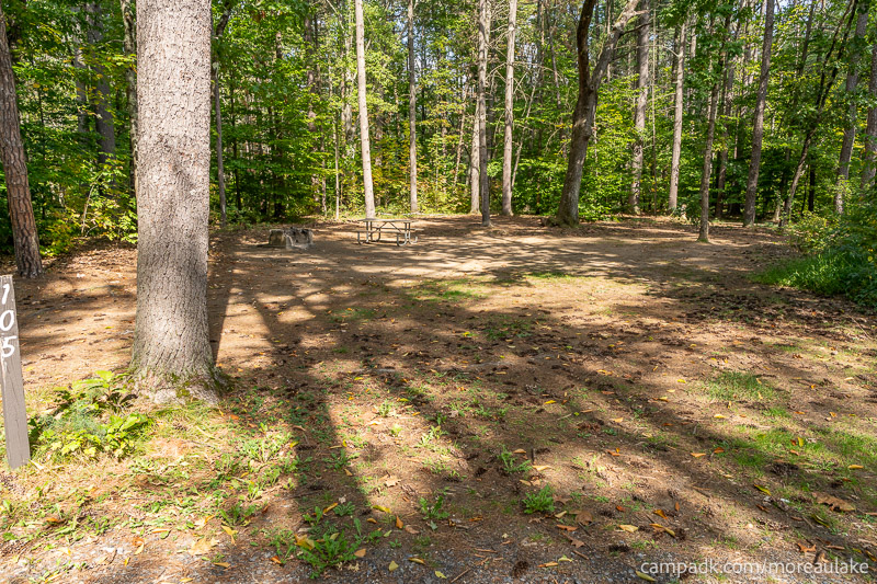 Campsite Photo of Site 105 at Moreau Lake State Park, New York - Looking at Site from Road Sign Visible